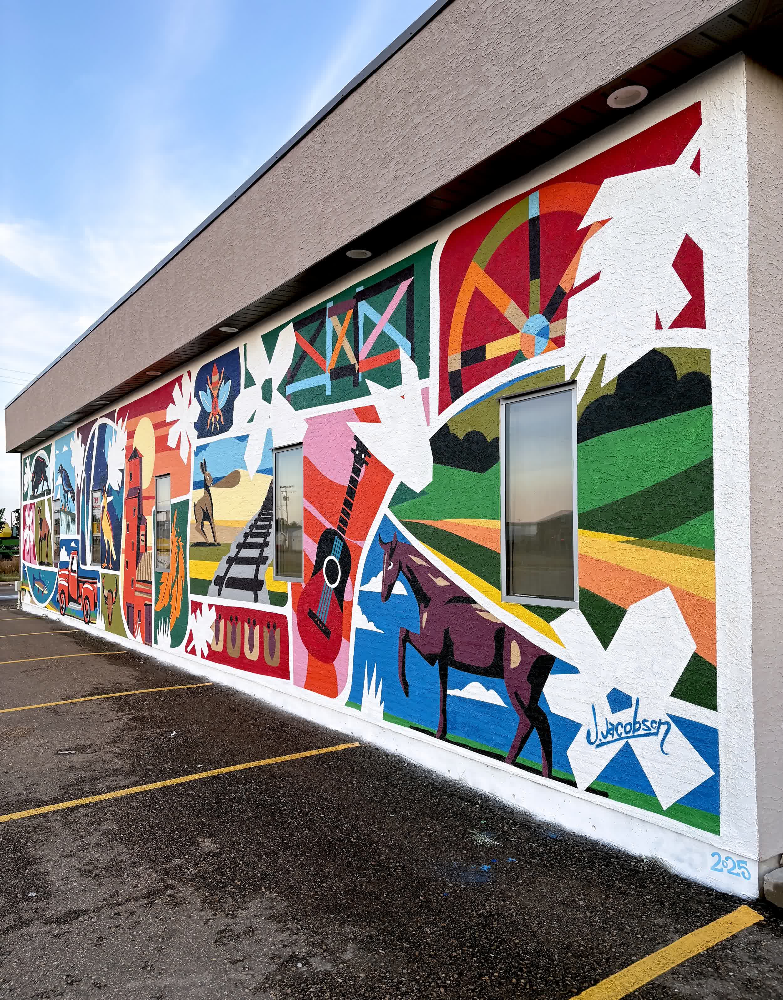 Wide shot of the completed mural in Shaunavon during Southwest Mural Fest.